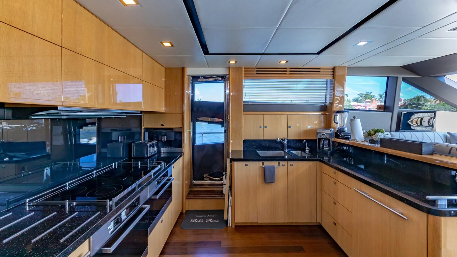 a kitchen with a large island aboard LADY COPE Yacht for Sale