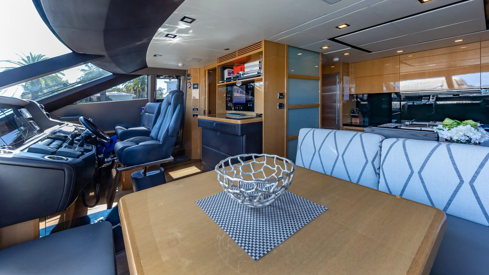 inside of a vehicle with a table and chairs and a large window aboard LADY COPE Yacht for Sale