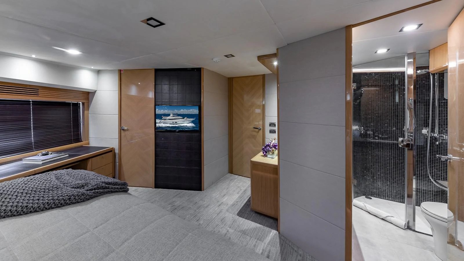 a bathroom with a glass shower aboard LADY COPE Yacht for Sale