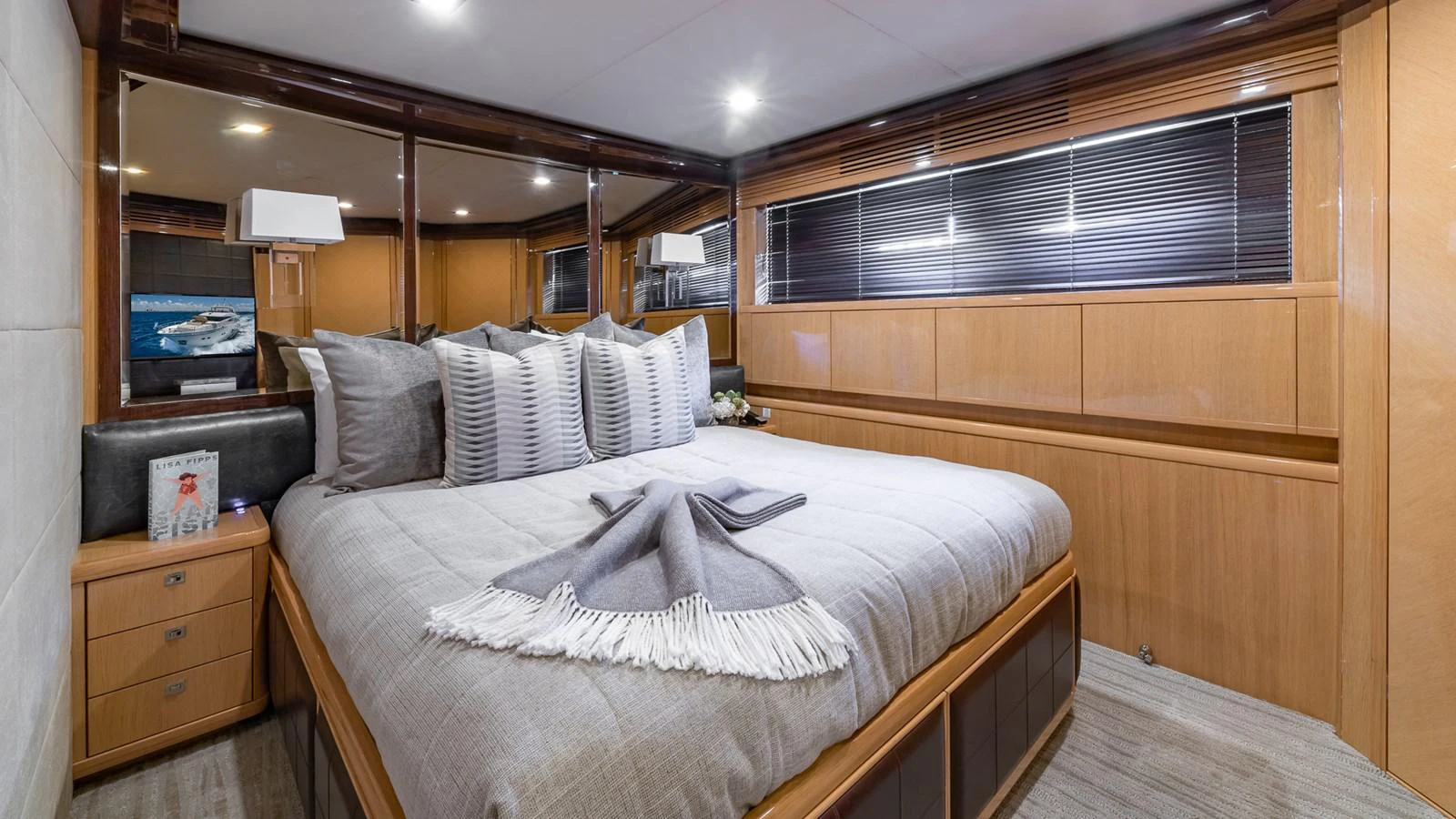 a bed in a room aboard LADY COPE Yacht for Sale
