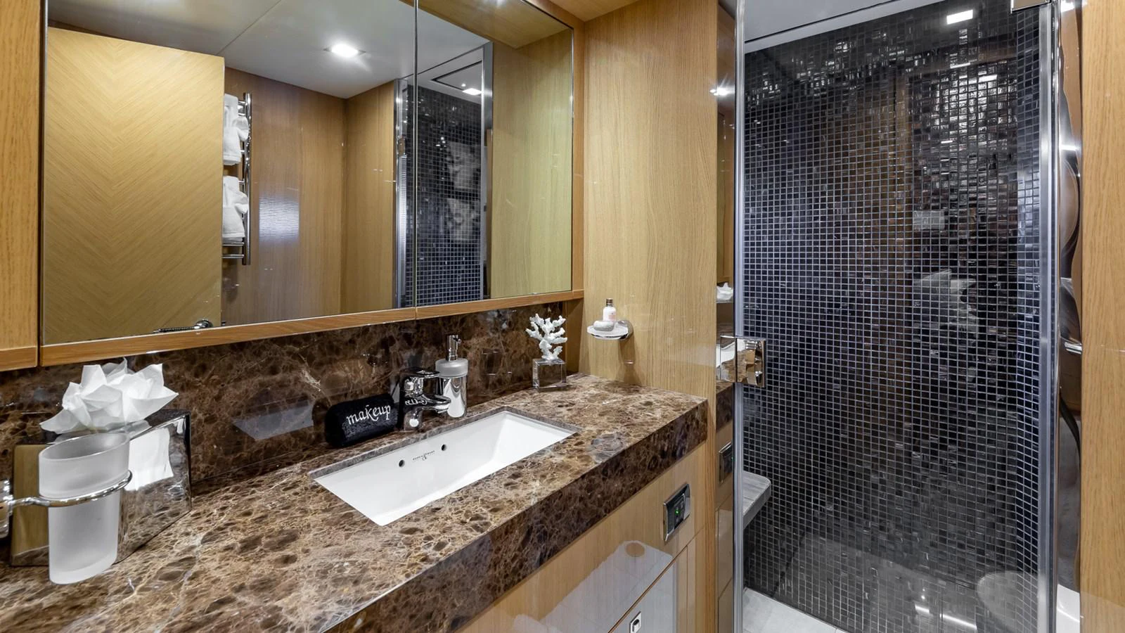 a bathroom with a countertop sink and a shower aboard LADY COPE Yacht for Sale