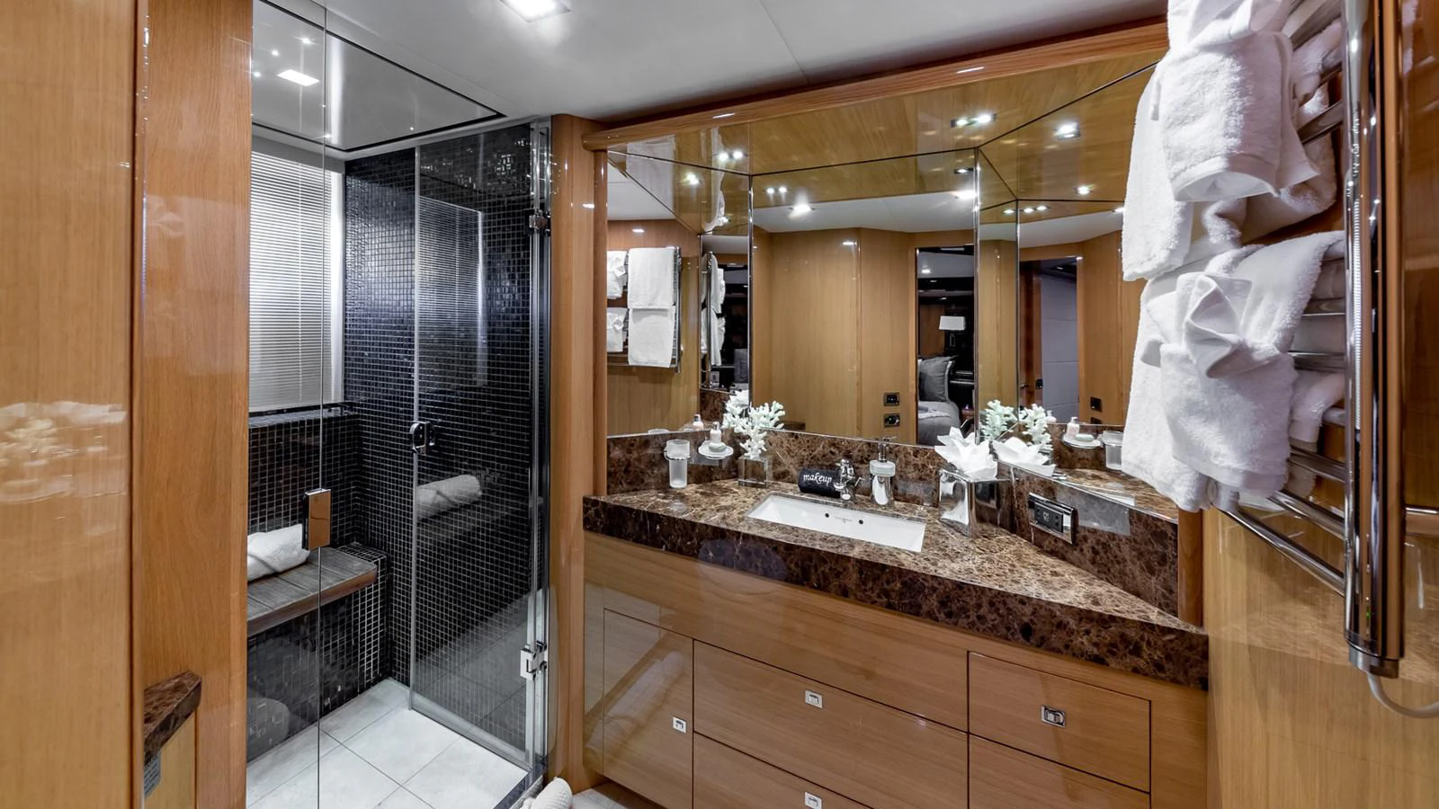 a bathroom with a large mirror aboard LADY COPE Yacht for Sale