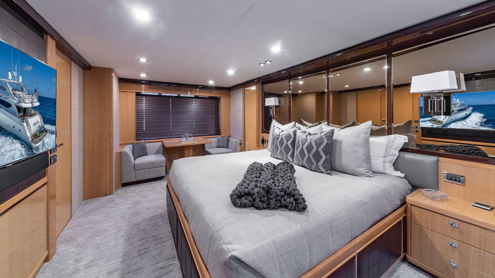 a bedroom with a large bed aboard LADY COPE Yacht for Sale