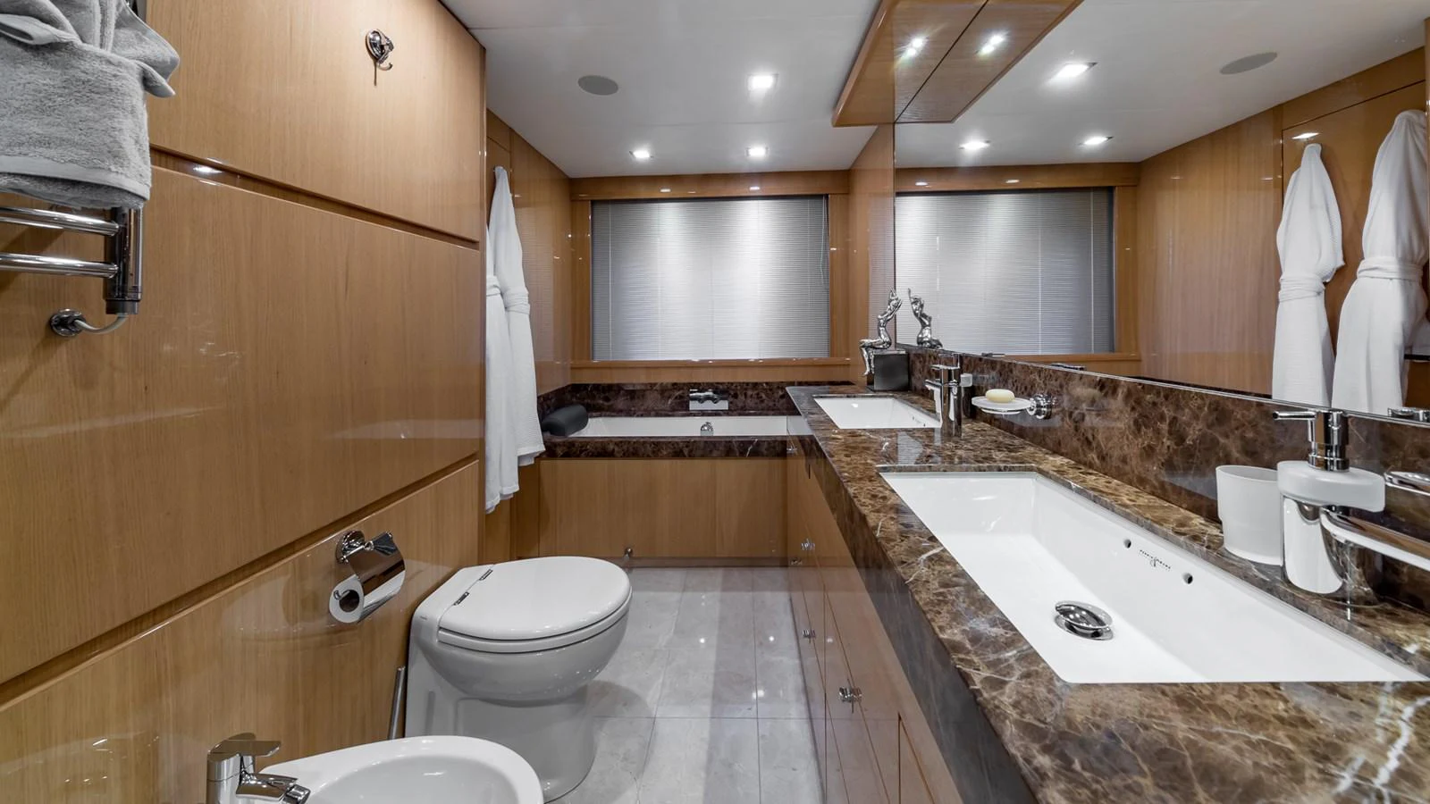 a bathroom with a large marble countertop aboard LADY COPE Yacht for Sale