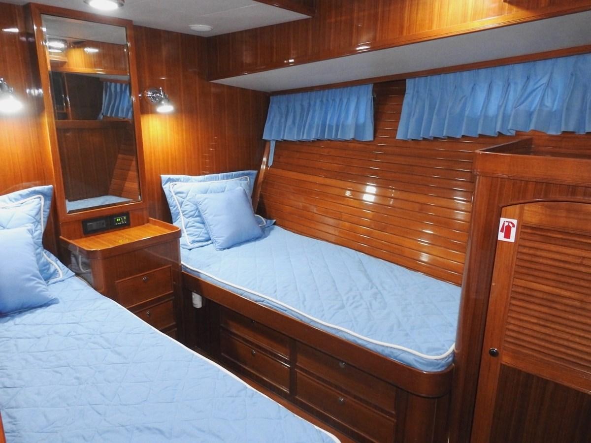 a couple of beds in a room aboard TELEMETRY Yacht for Sale