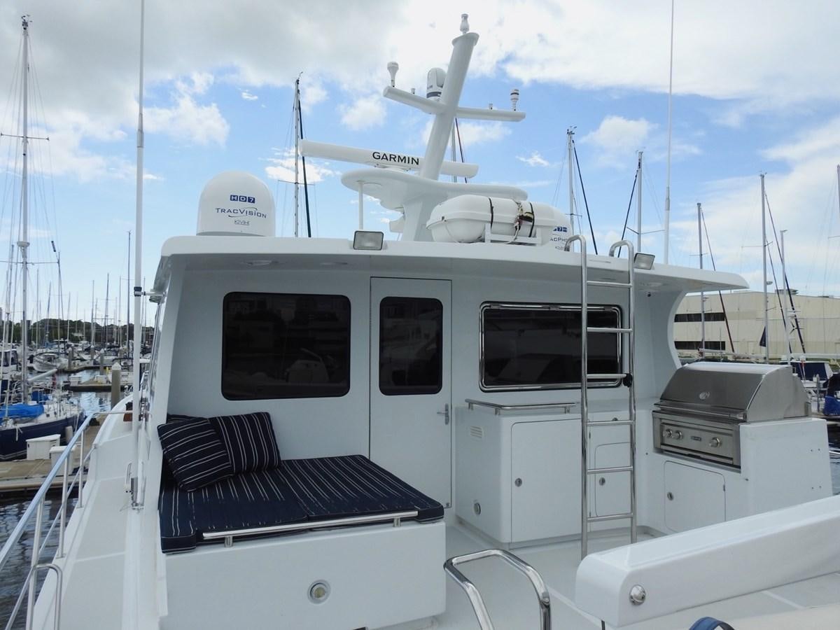 a boat with a black and white object on it aboard TELEMETRY Yacht for Sale