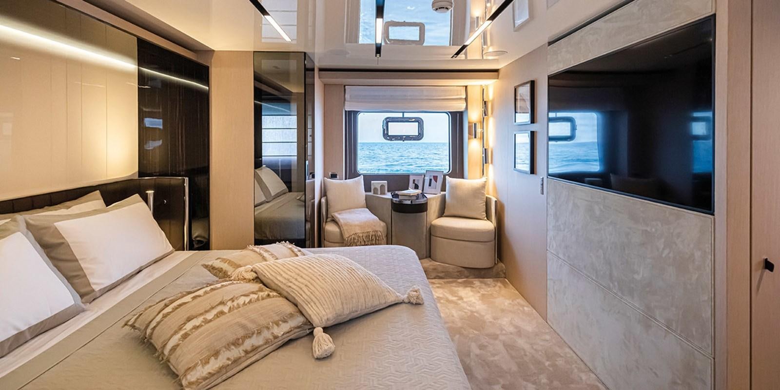 a hotel room with a bed and a large window aboard SESSANTASETTE 67 Yacht for Sale
