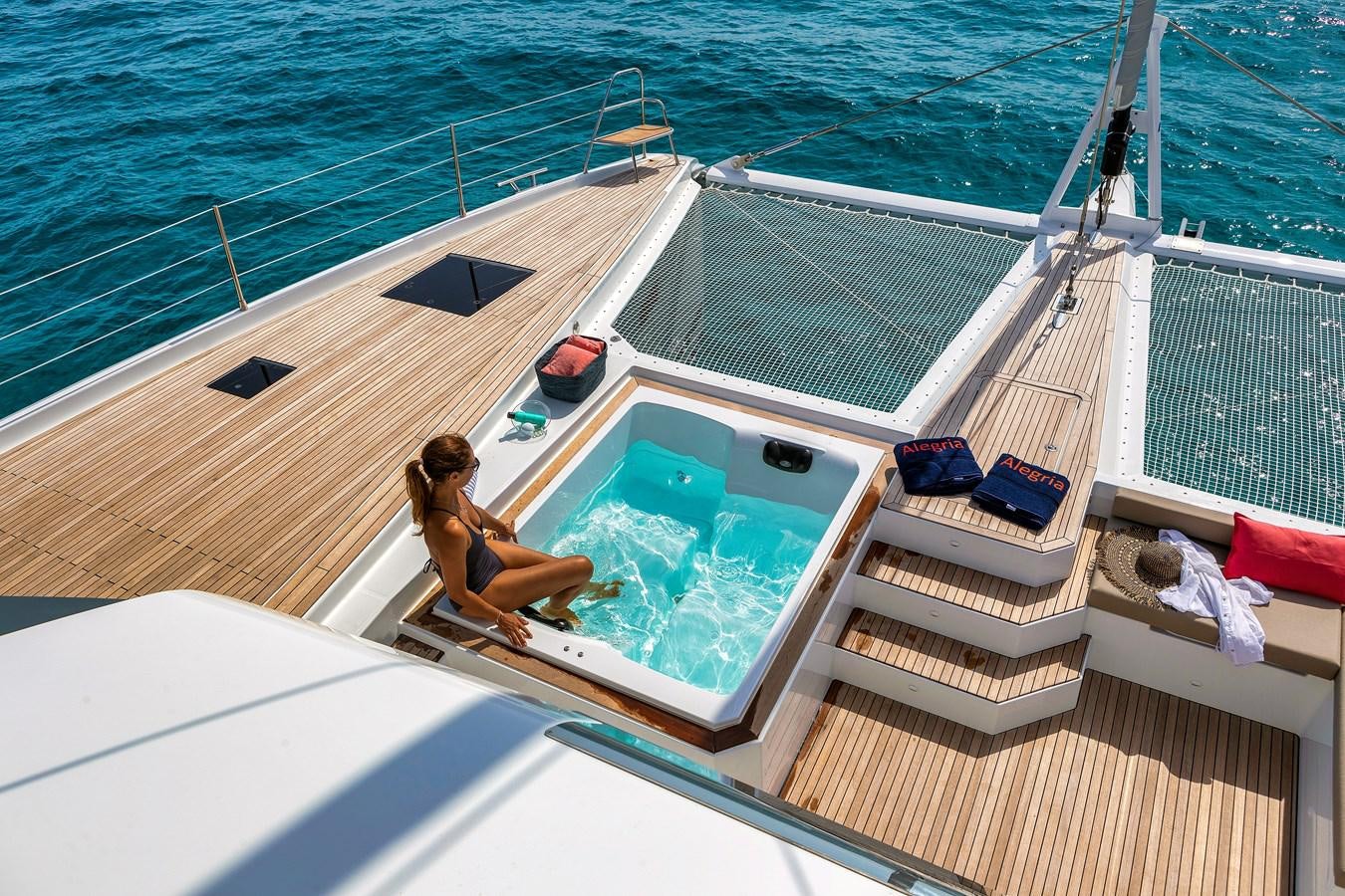 a person sitting on a boat aboard INSPIRANTE Yacht for Sale