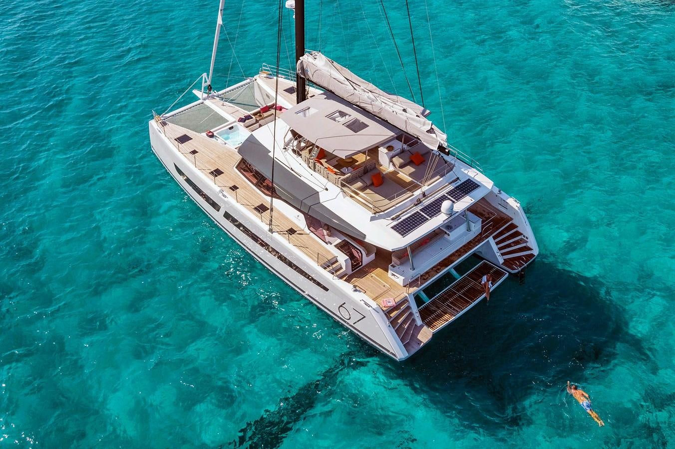 a large ship in the ocean aboard INSPIRANTE Yacht for Sale