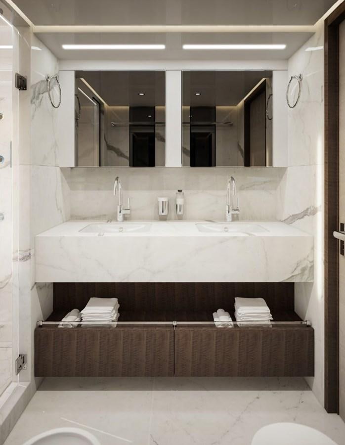 a bathroom with a sink and a mirror aboard KRISHH Yacht for Sale