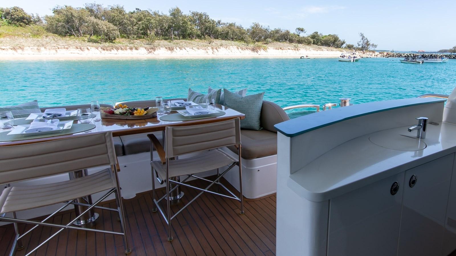 a table and chairs on a boat aboard SEA WOLF Yacht for Sale