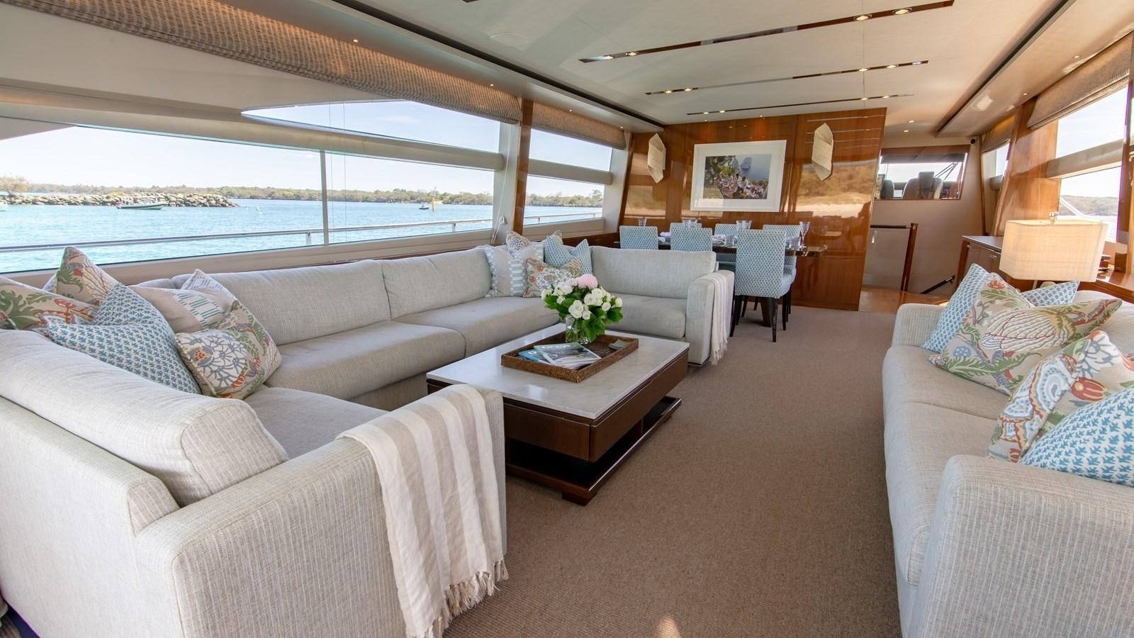 a living room with a large window aboard SEA WOLF Yacht for Sale
