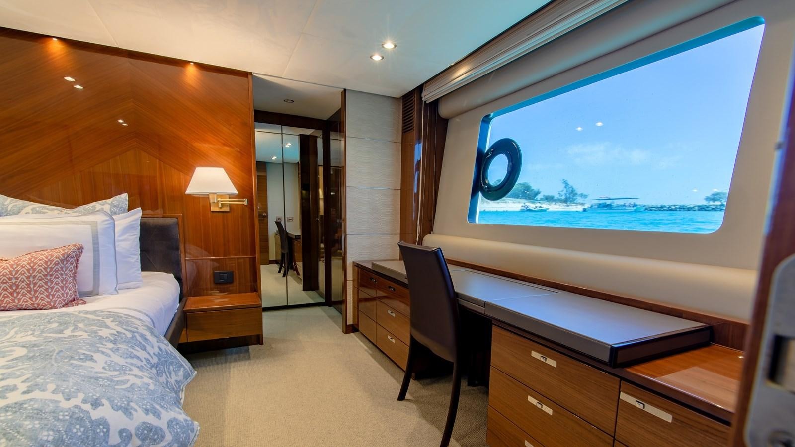 a room with a bed and a large screen aboard SEA WOLF Yacht for Sale