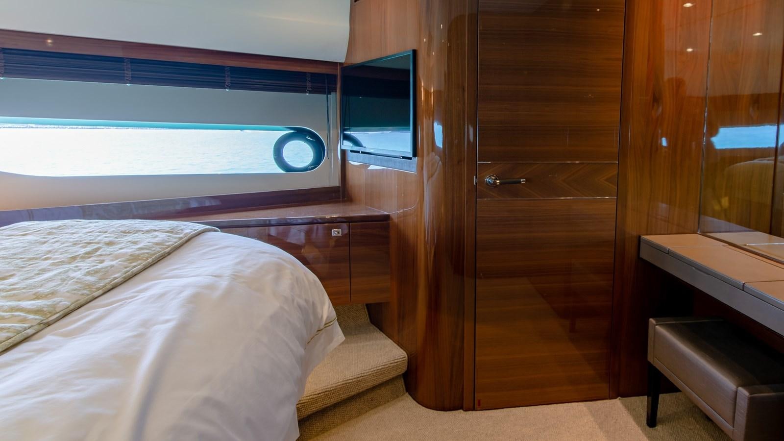 a room with a bed and a closet aboard SEA WOLF Yacht for Sale