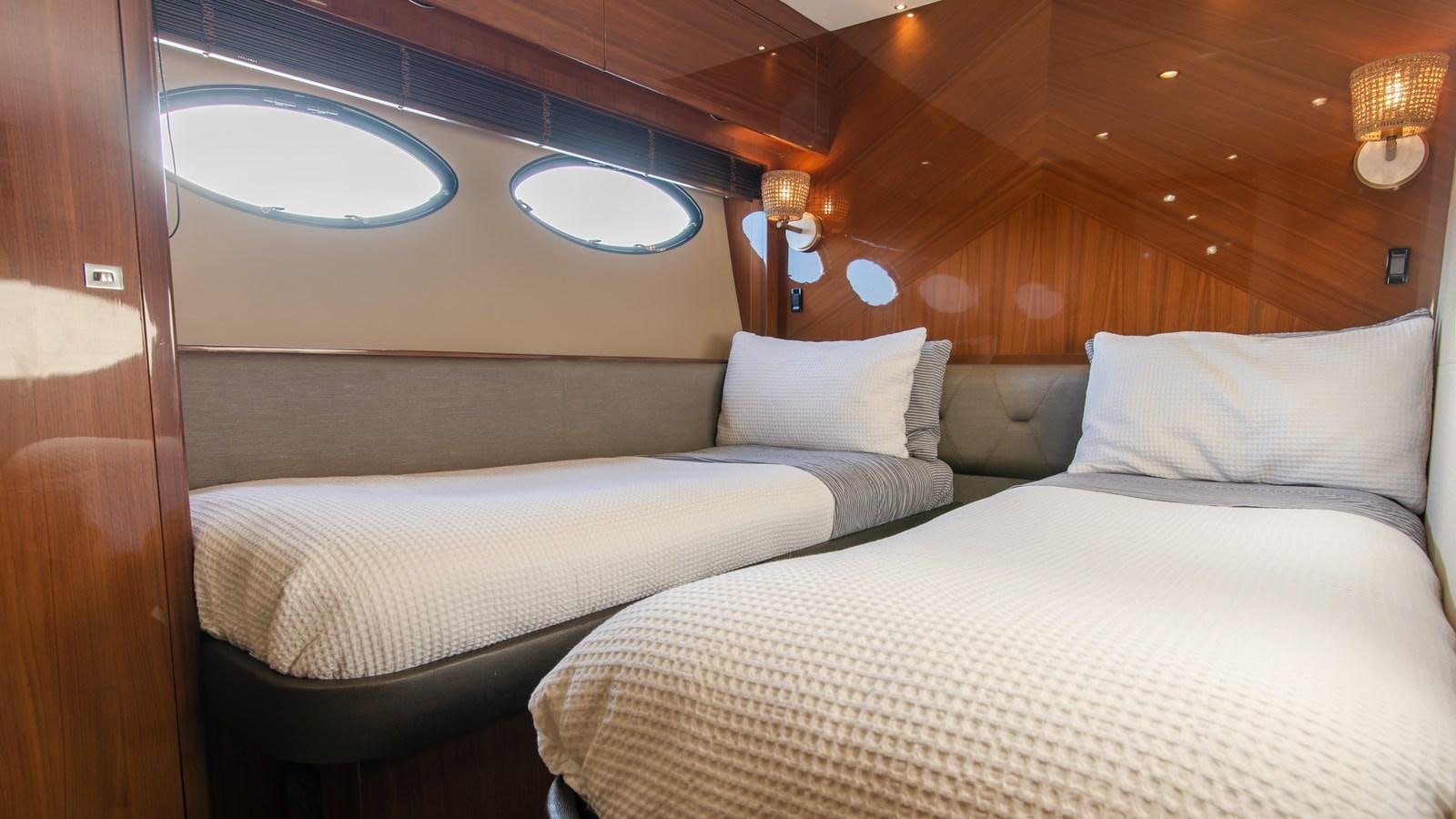 a couple of beds in a room aboard SEA WOLF Yacht for Sale