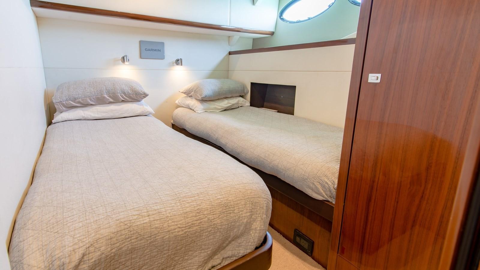 a room with two beds aboard SEA WOLF Yacht for Sale