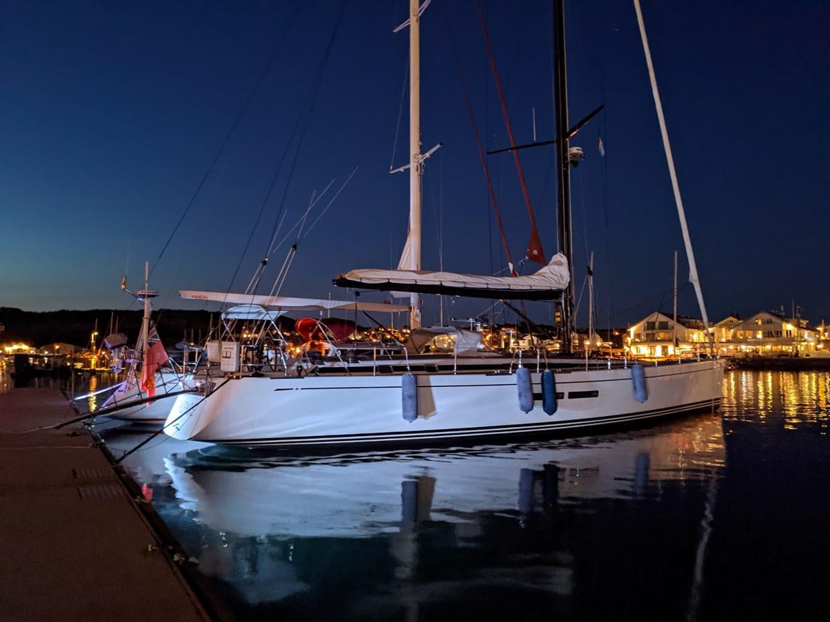 a boat docked at night aboard SALPARE Yacht for Sale