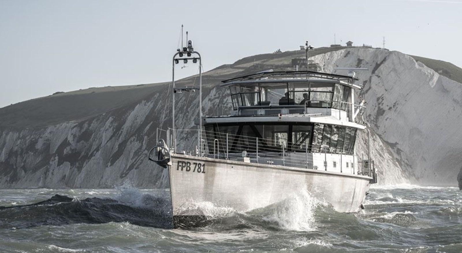 a boat on a body of water aboard COCHISE Yacht for Sale