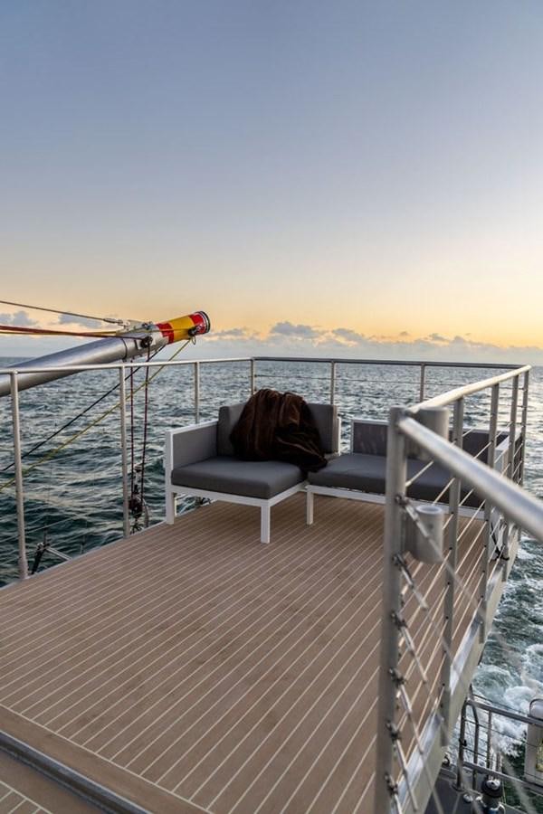 a person sitting on a boat aboard COCHISE Yacht for Sale