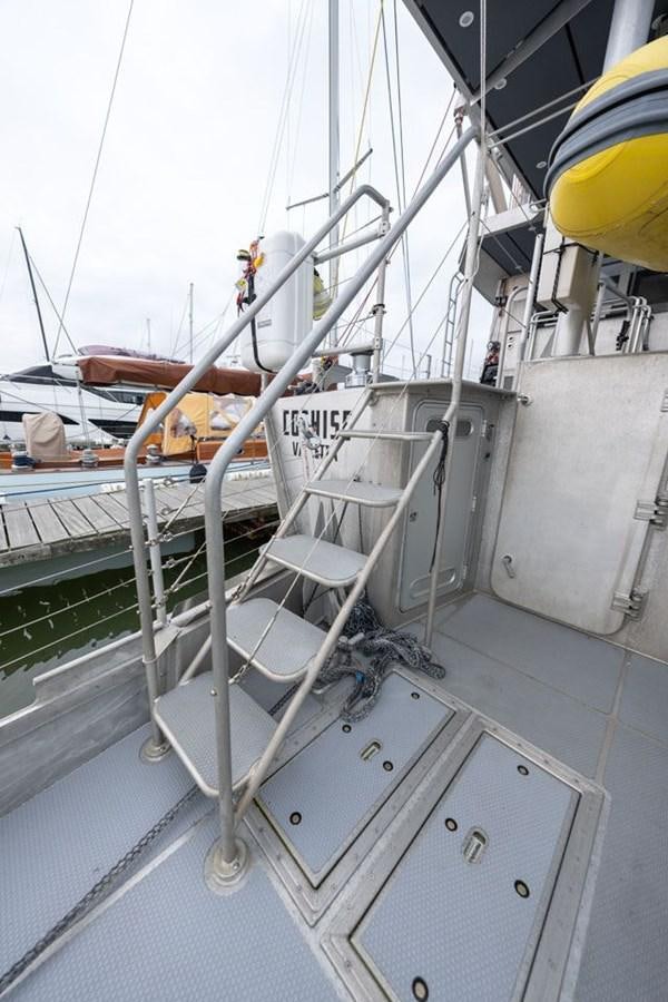 a boat with a large body of water in the background aboard COCHISE Yacht for Sale