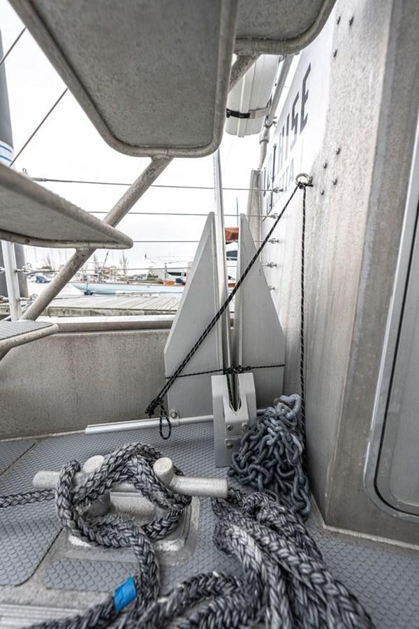 a cat sitting on a boat aboard COCHISE Yacht for Sale
