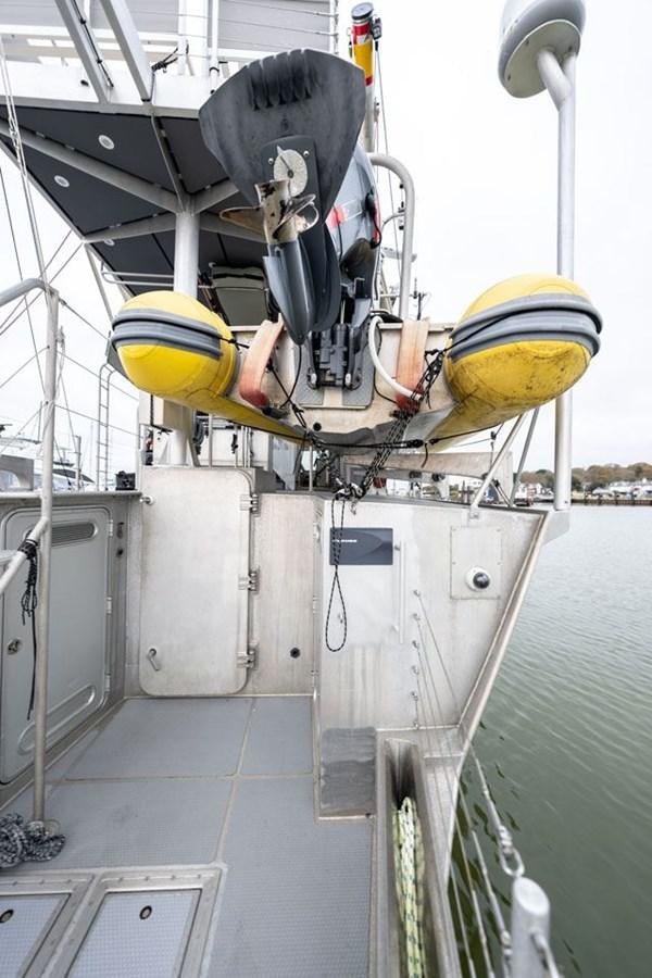 a large white machine with a large piece of equipment on it aboard COCHISE Yacht for Sale