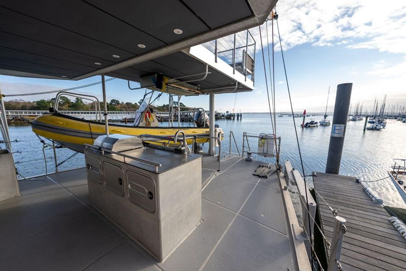 a boat on a deck aboard COCHISE Yacht for Sale