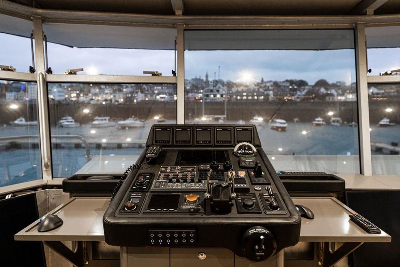 a video game console on a table aboard COCHISE Yacht for Sale