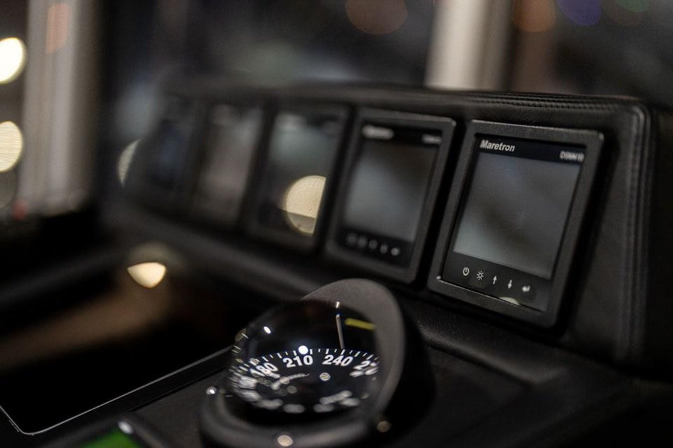 a car with a screen aboard COCHISE Yacht for Sale