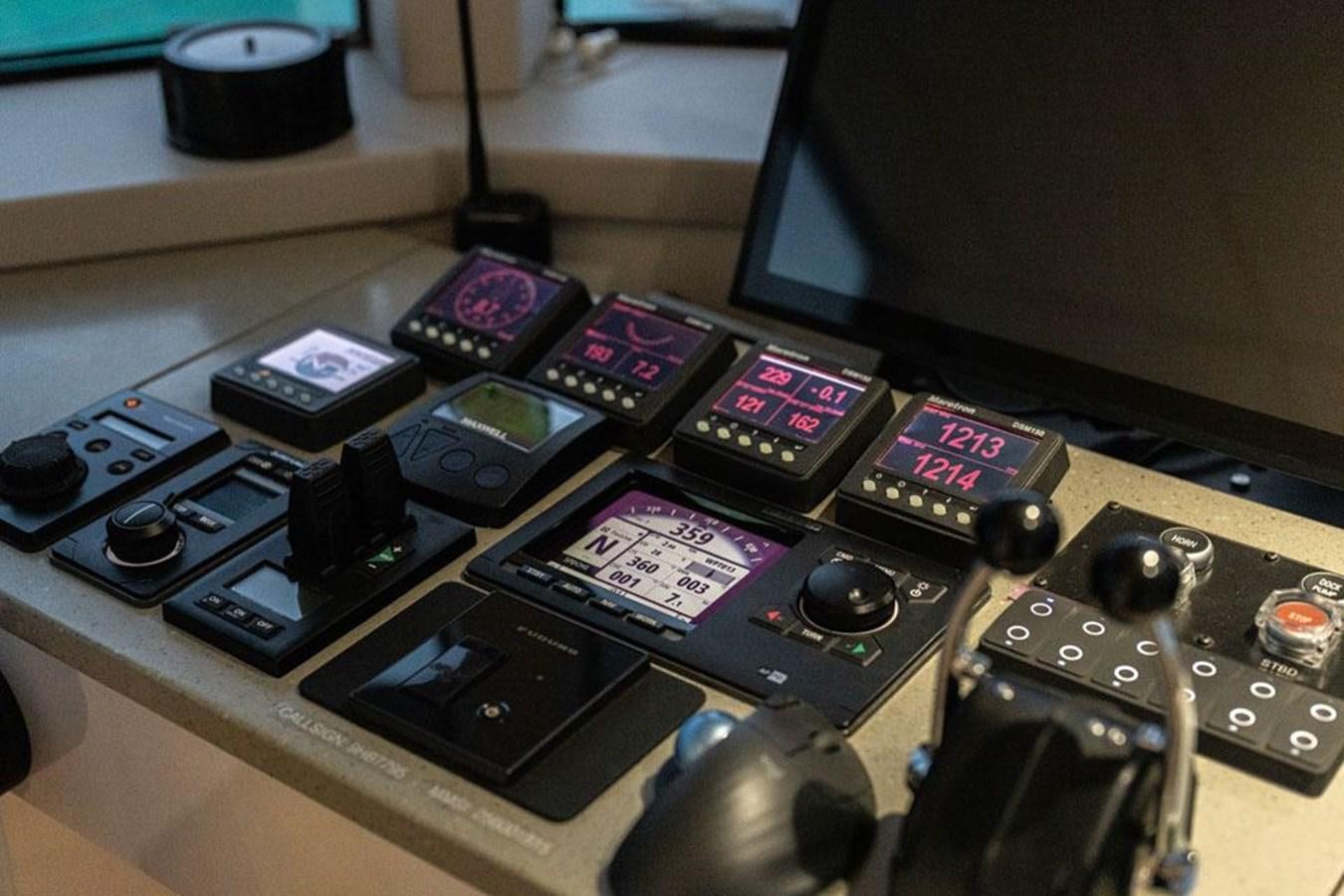 a machine with buttons and a screen aboard COCHISE Yacht for Sale