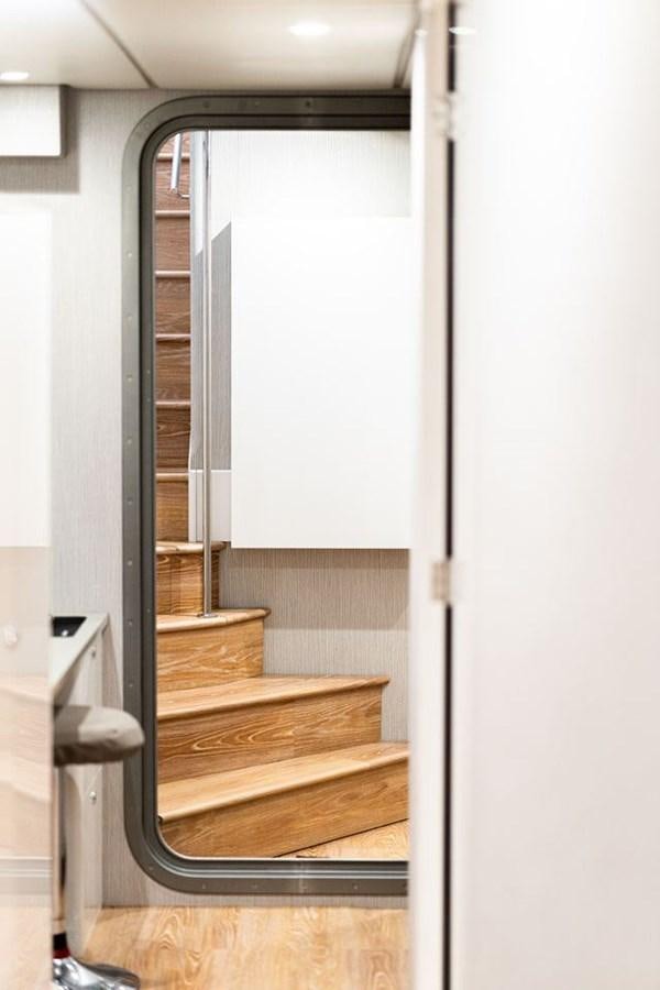 a door with a window aboard COCHISE Yacht for Sale