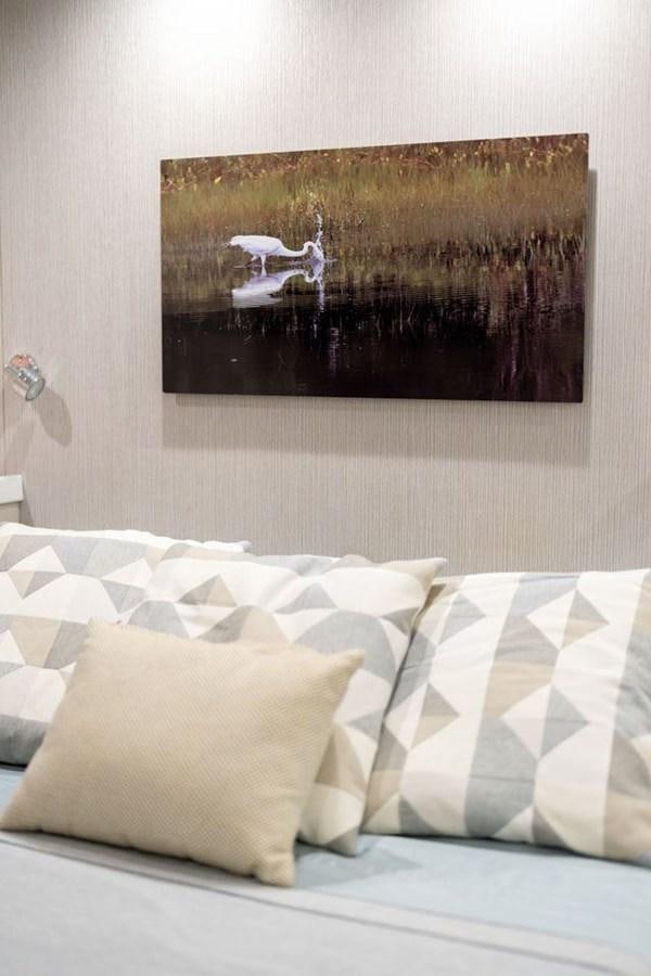 a painting on a wall aboard COCHISE Yacht for Sale