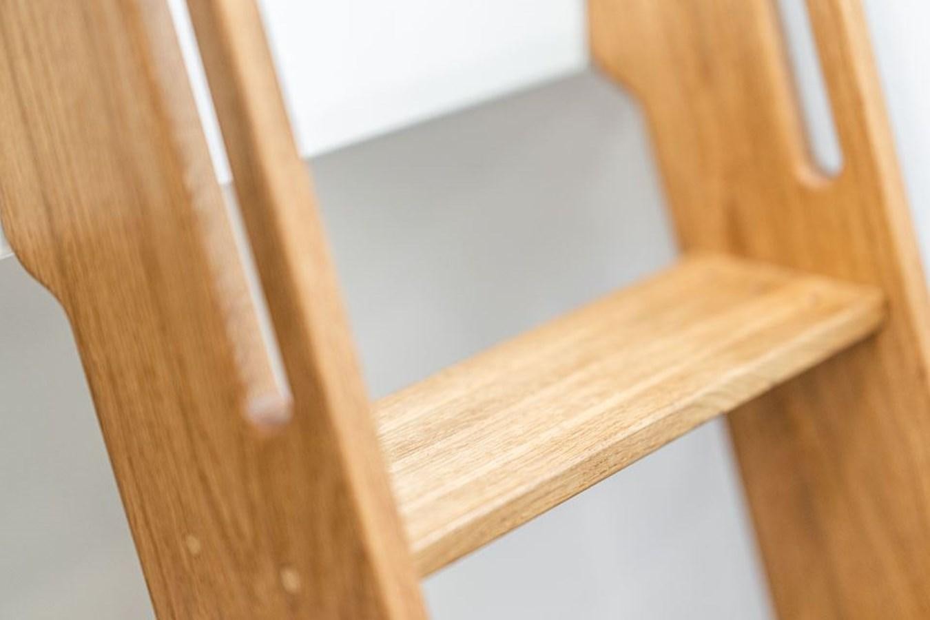 a wooden shelf with white handles aboard COCHISE Yacht for Sale