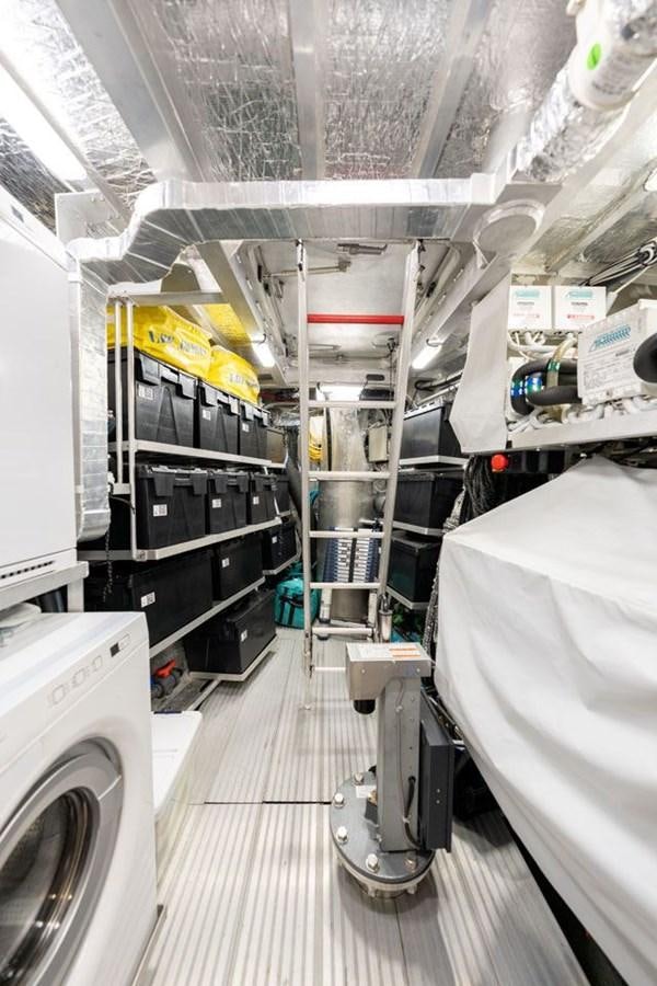 a large machine in a room aboard COCHISE Yacht for Sale