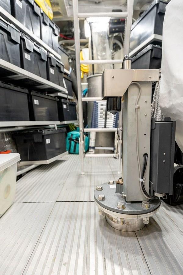 a large machine in a factory aboard COCHISE Yacht for Sale