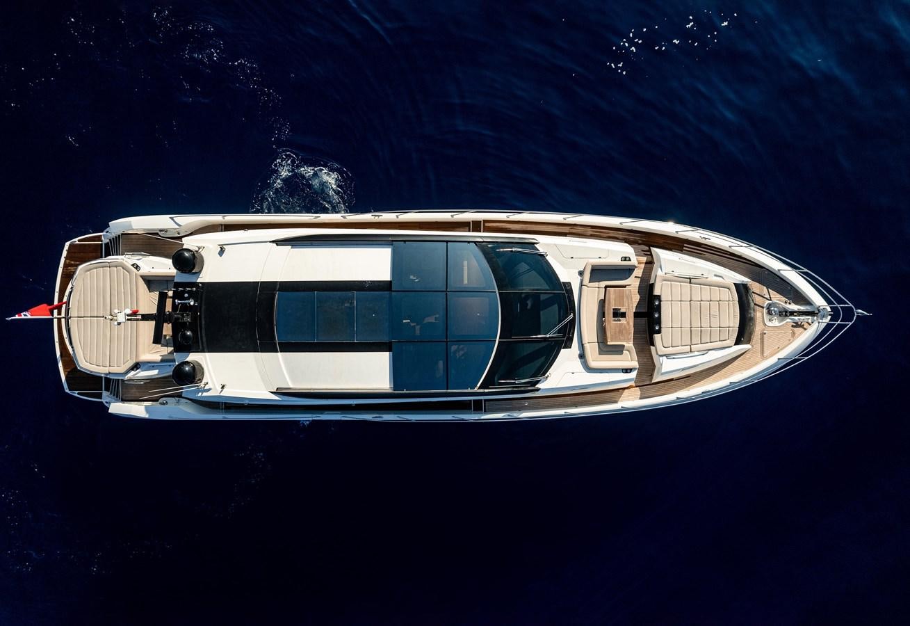 a white boat in the water aboard CLAVIS Yacht for Sale