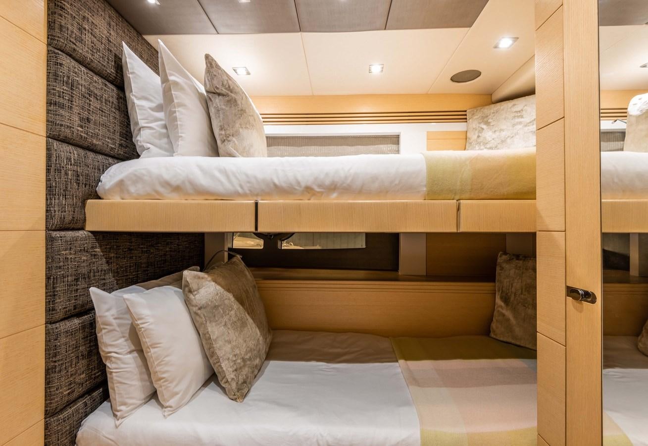 a bed with pillows aboard CLAVIS Yacht for Sale
