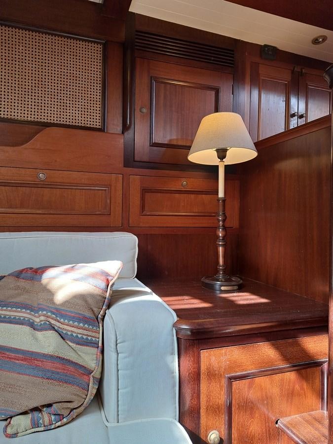 a lamp on a bed aboard KIM Yacht for Sale