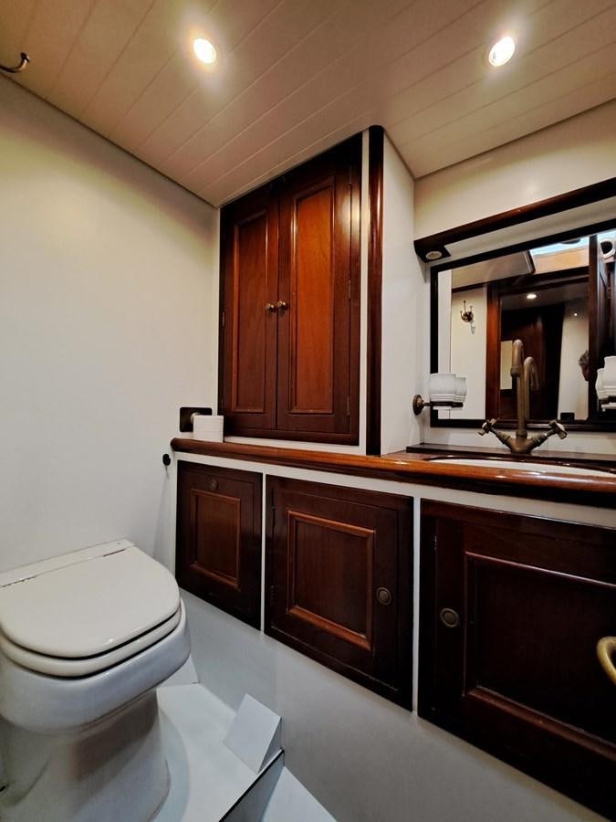 a bathroom with a sink and a toilet aboard KIM Yacht for Sale