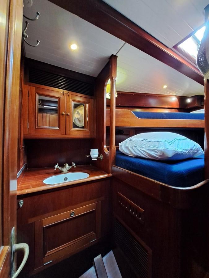 a small bathroom with a bunk bed aboard KIM Yacht for Sale