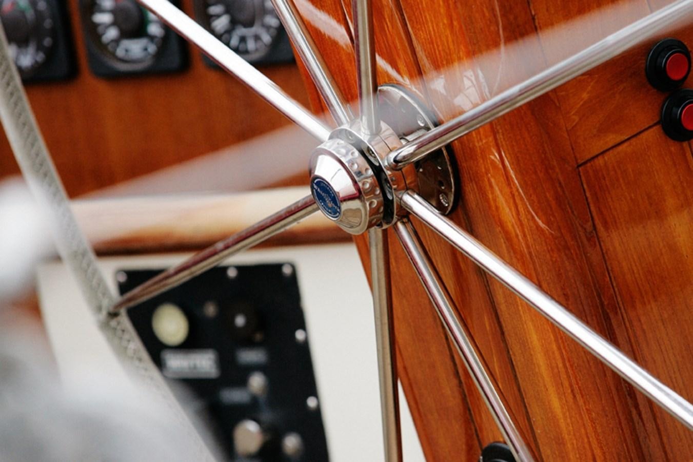 a close-up of a guitar aboard KIM Yacht for Sale