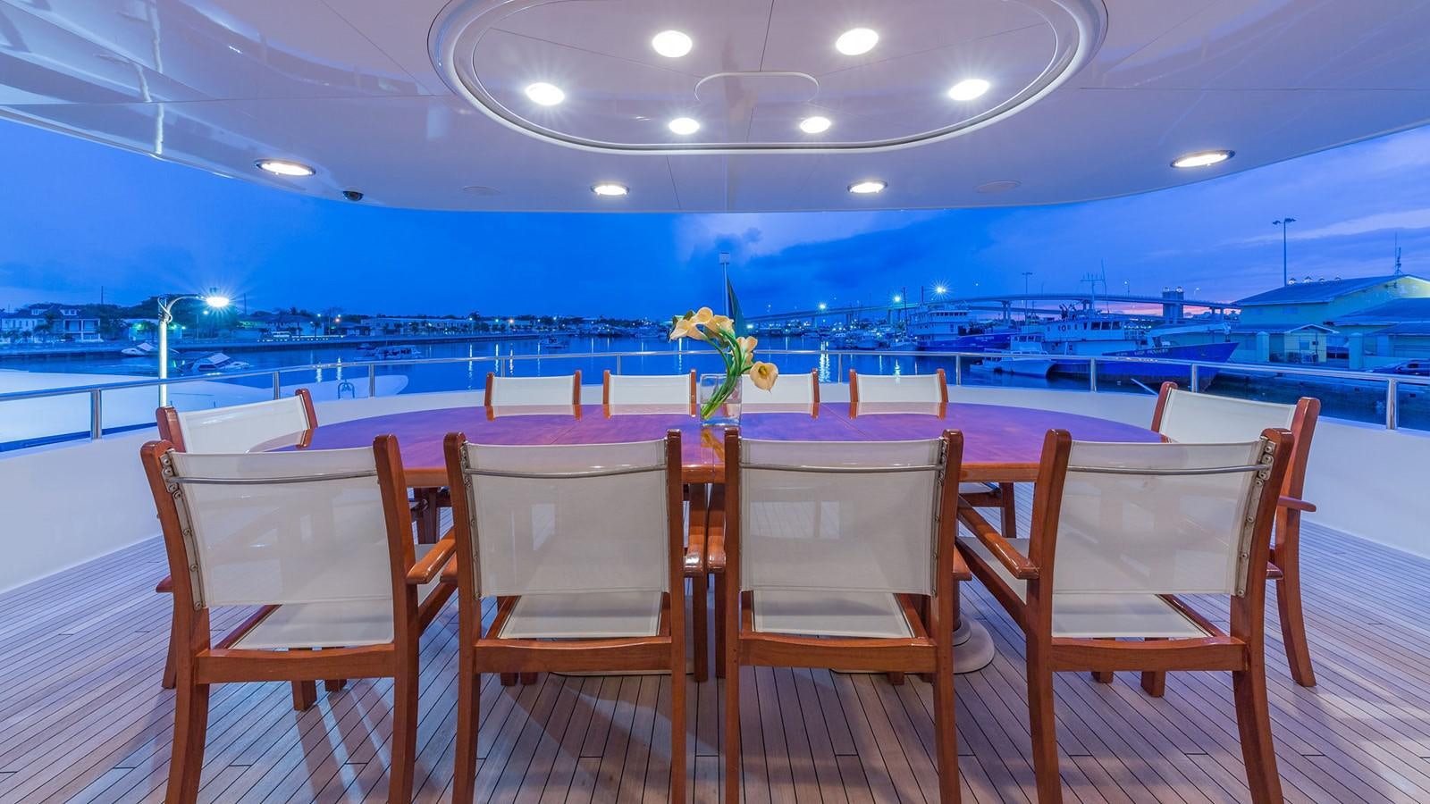 a table set up for a dinner party aboard AT LAST Yacht for Charter