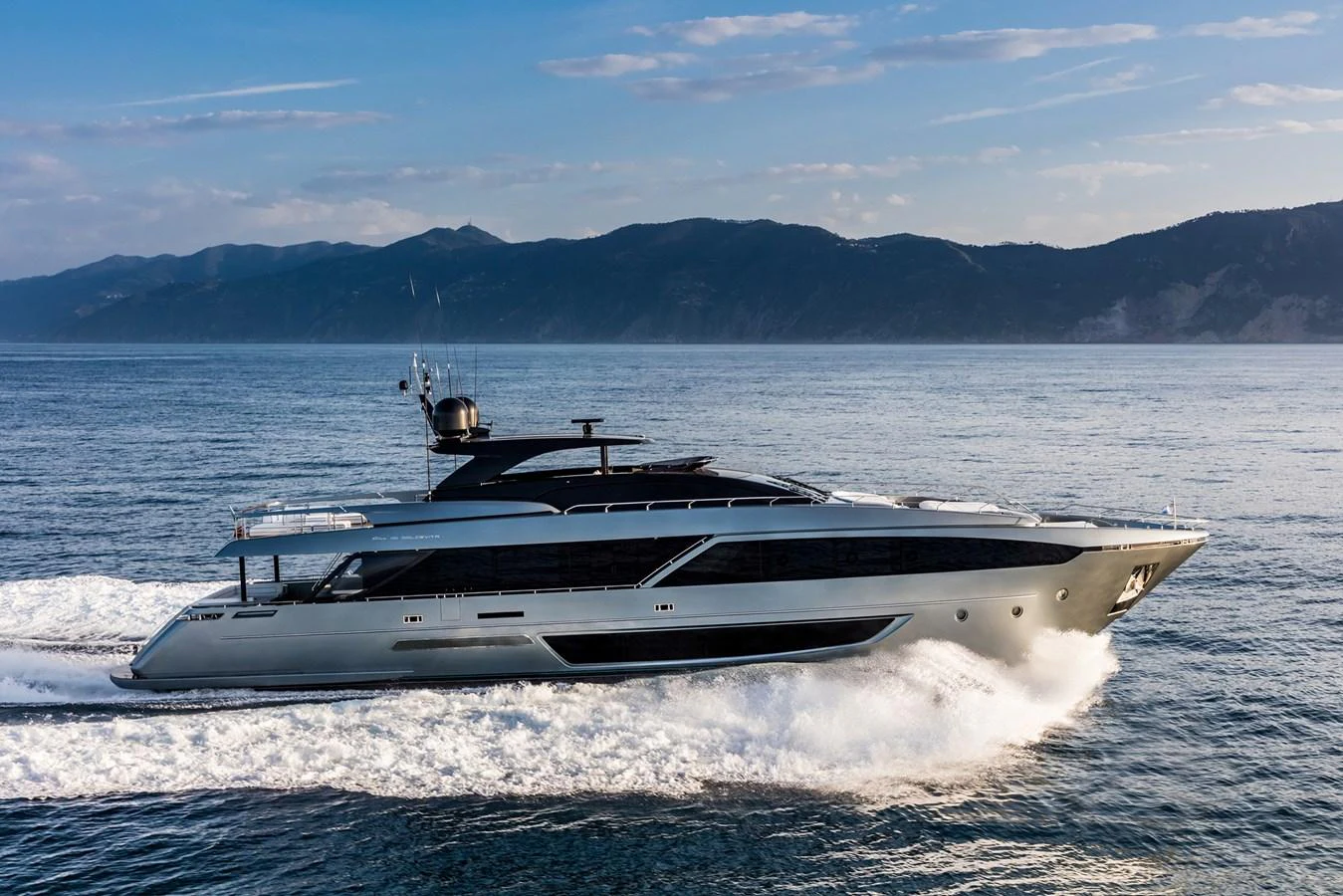 a boat on the water aboard RIVA 110/27 DOLCEVITA Yacht for Sale