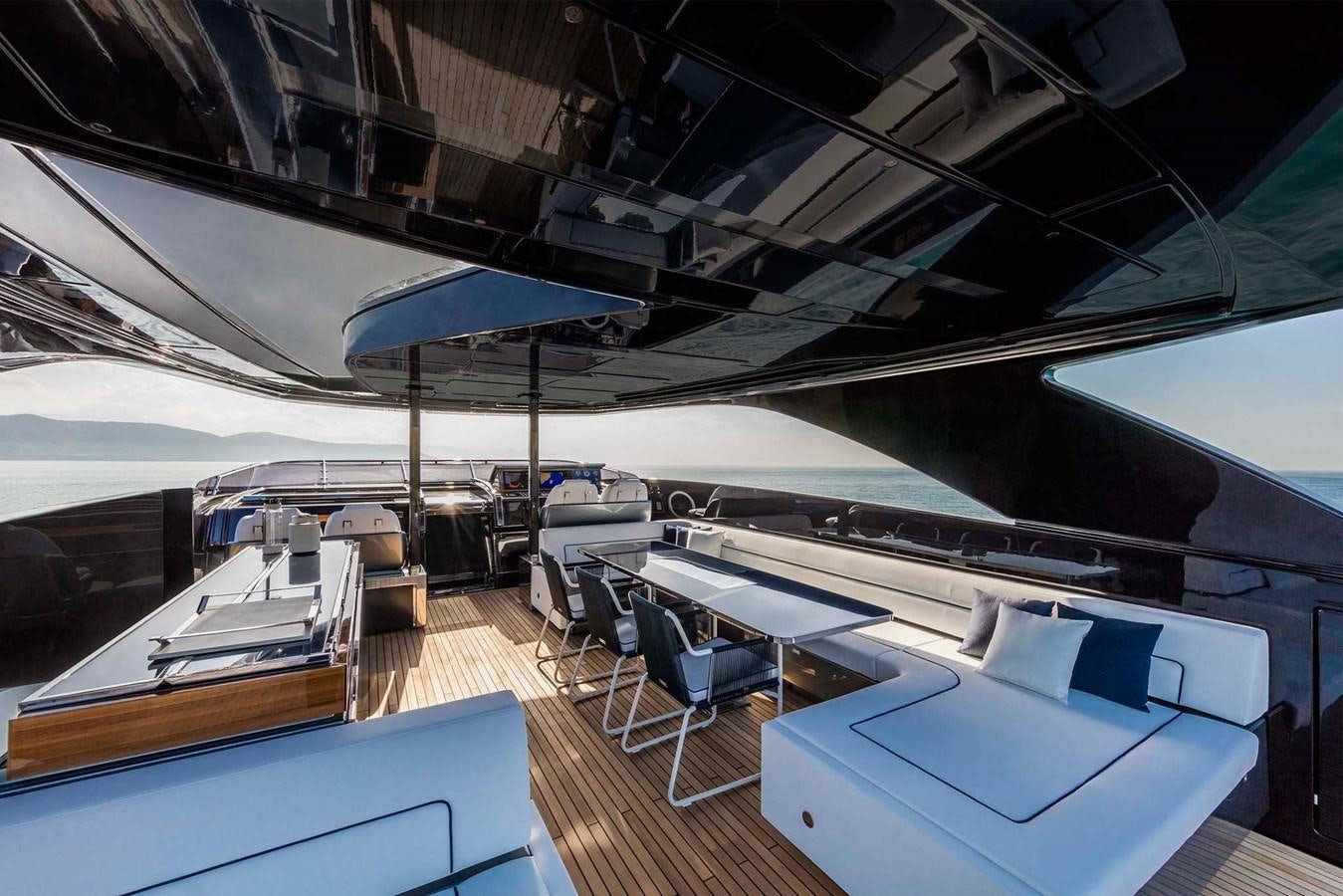 a large room with tables and chairs aboard PERRI BEACH Yacht for Sale