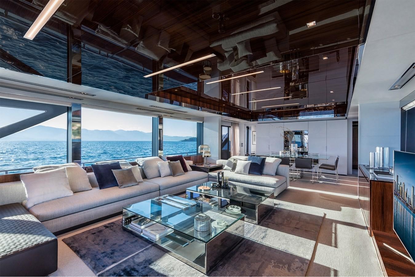 a living room with a large window aboard PERRI BEACH Yacht for Sale