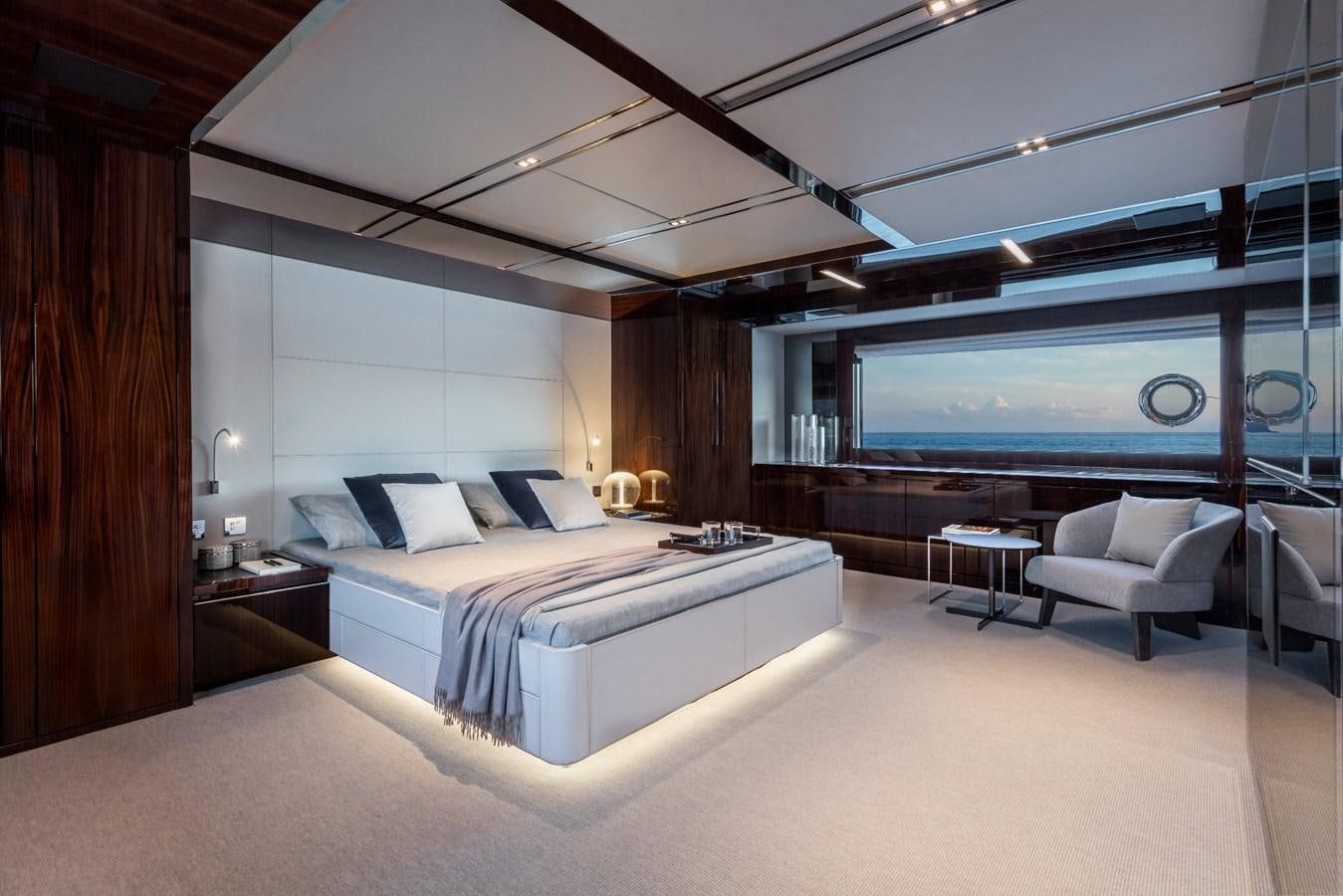 a large bedroom with a large bed aboard PERRI BEACH Yacht for Sale