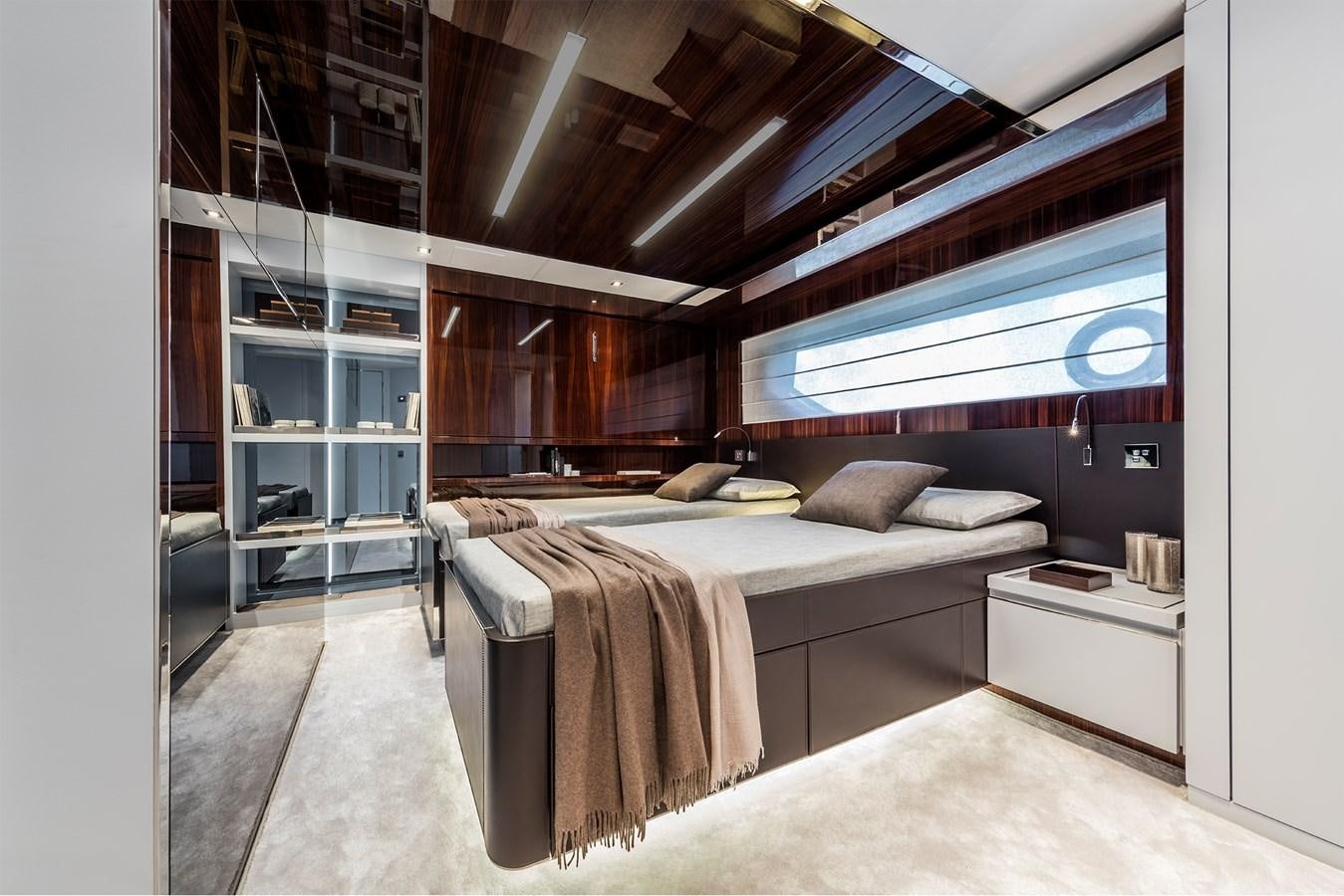 a bedroom with a large bed aboard PERRI BEACH Yacht for Sale