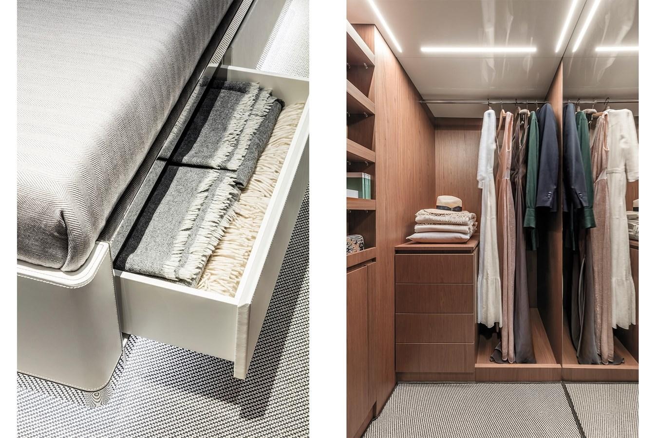a room with a bed and a shelf with clothes on it aboard RIVA 90' ARGO   Yacht for Sale
