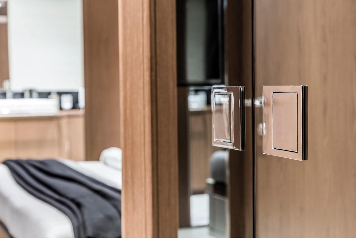 a door with a handle aboard RIVA 90' ARGO   Yacht for Sale