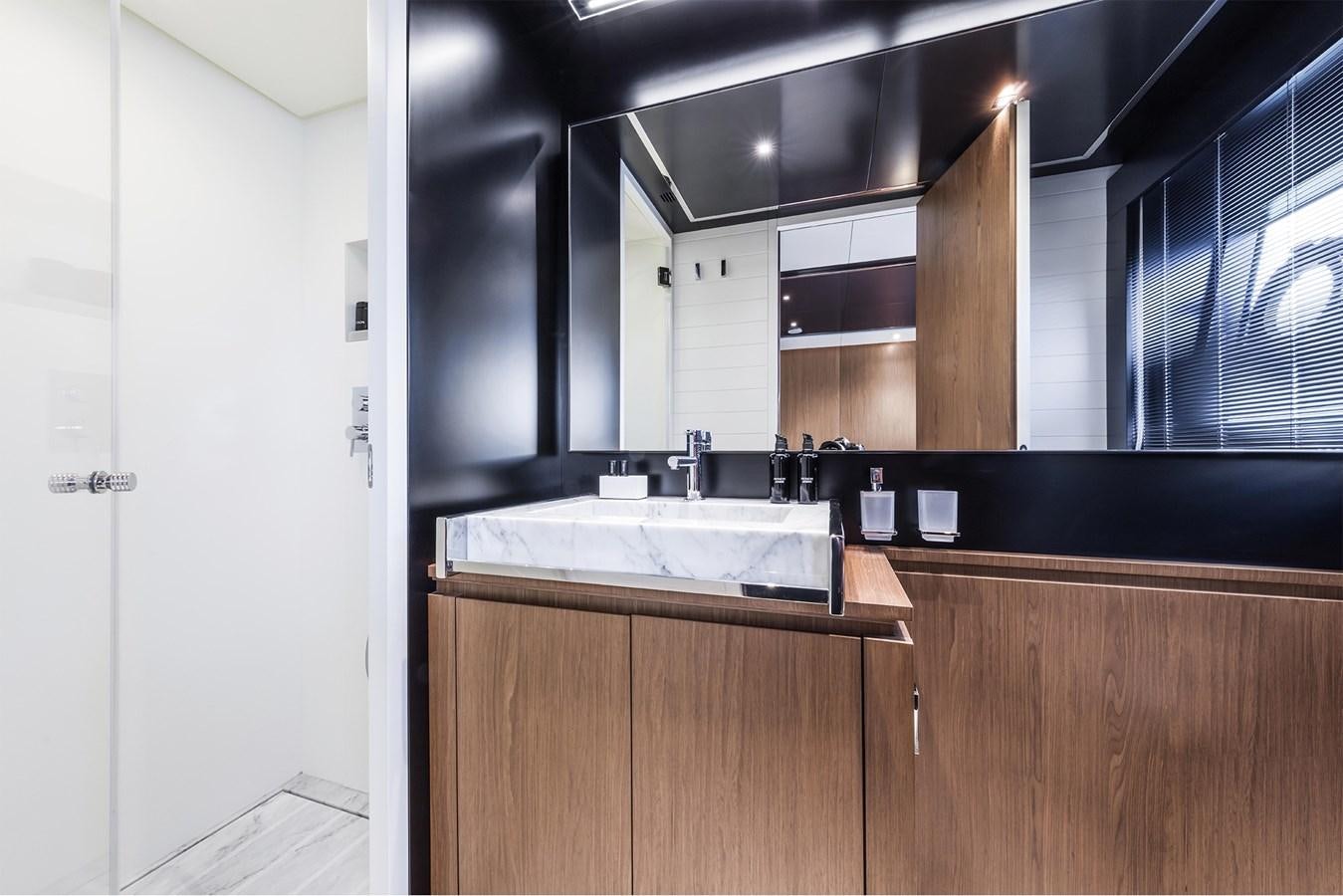 a kitchen with a sink and cabinets aboard RIVA 90' ARGO   Yacht for Sale